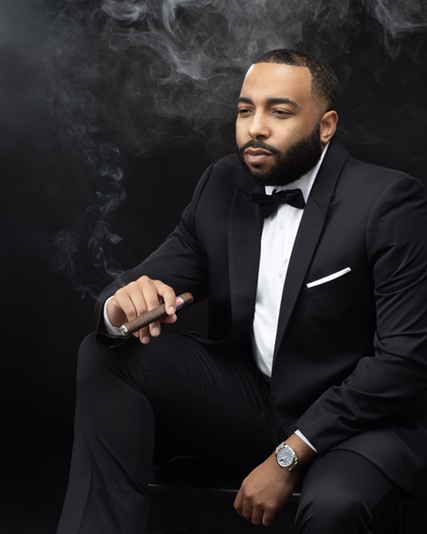 studio portrait with cigar